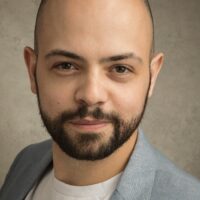 A headshot of actor Will Arundell.